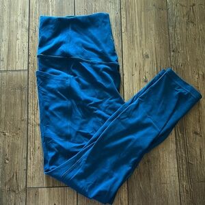 Athleta salutation stash tight